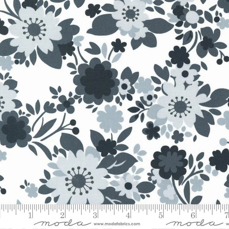 Concrete Jungle quilting fabric 33722 11 in white and ivory palette with navy and blue accents